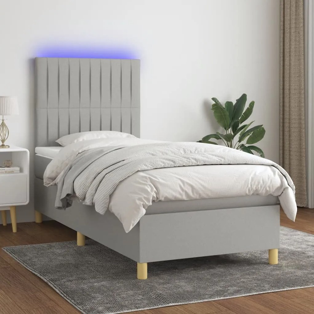 Letto a molle materasso e led grigio chiaro 100x200 cm tessuto