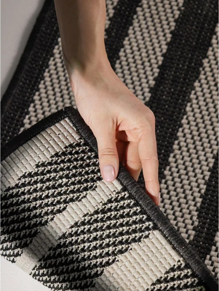 Tappeto da interno/esterno nero/color crema 120x170 cm Haringey Allington – Ted Baker