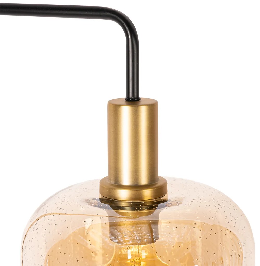 Lampada da terra di design nera con ottone e vetro ambrato - Zuzanna
