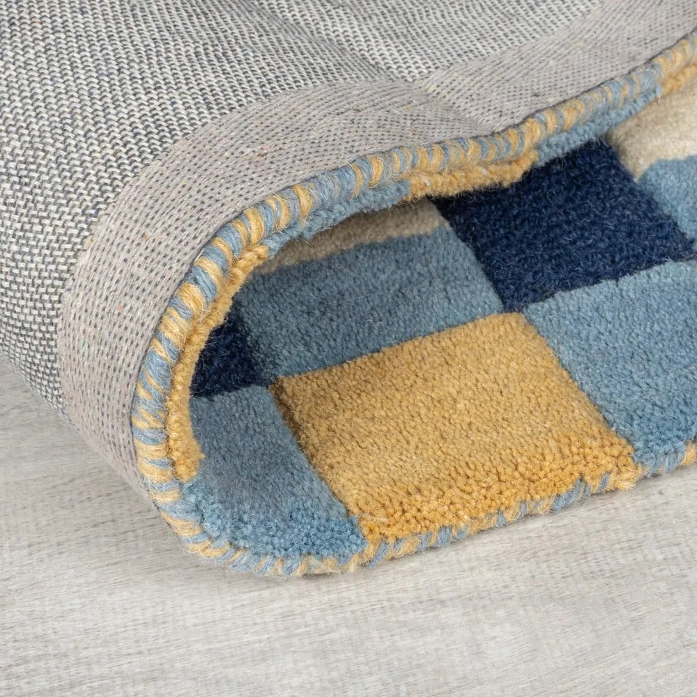 Tappeto blu in lana tessuto a mano 160x230 cm Kai Wool Border - Flair Rugs