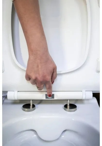 Cersanit K701-104 - WC sospeso con sedile CITY OVAL in ceramica/bianco