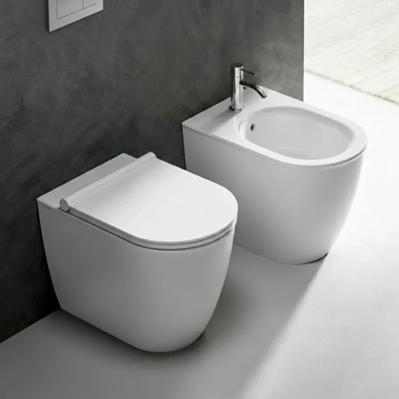 Vaso filomuro traslato bianco opaco con sedile soft close di Ceramica Dolomite Mayka