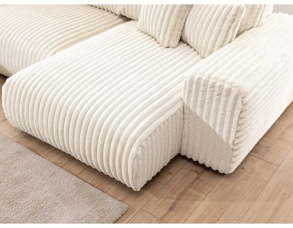 Divano angolare color crema (con penisola a sinistra/a U) rivestito in velluto a coste Justin – Ropez