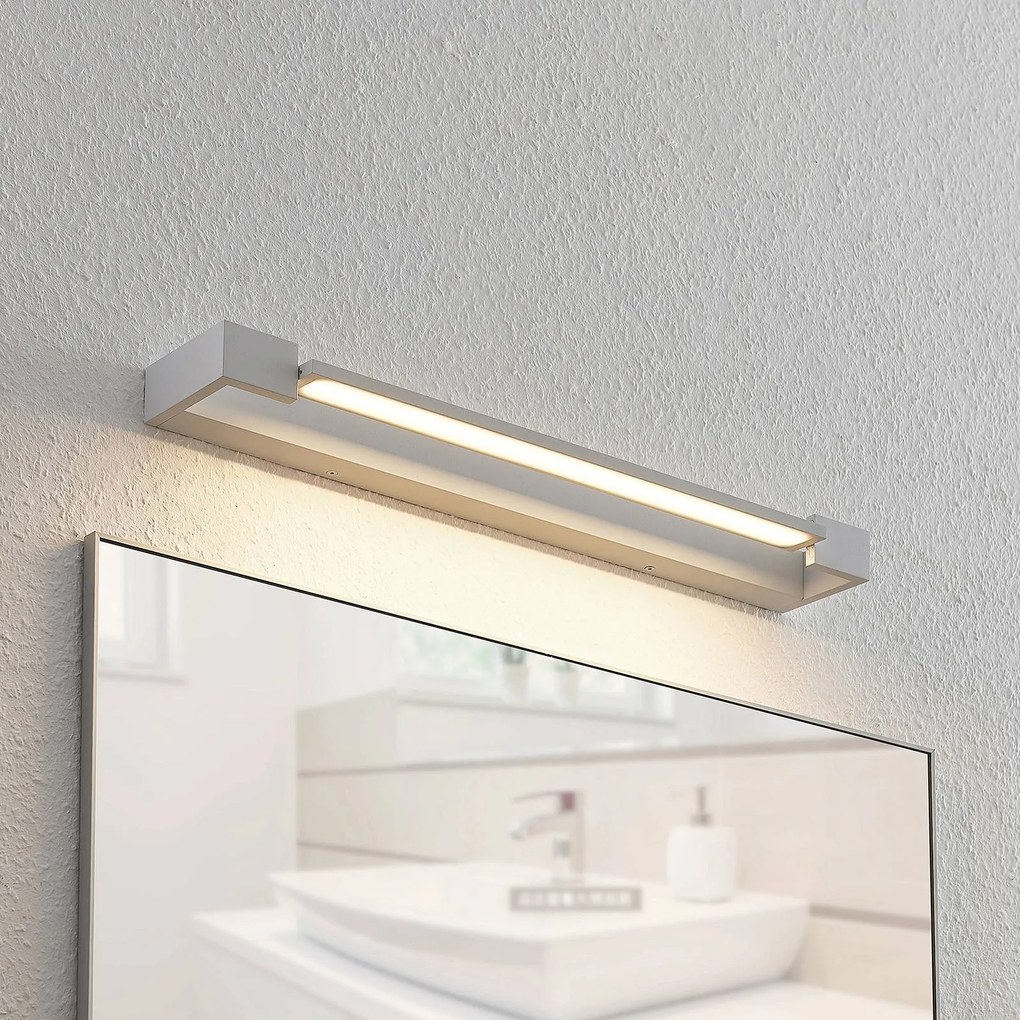 Arcchio applique LED per il bagno Jora, 60 cm, bianco, metallo, IP44