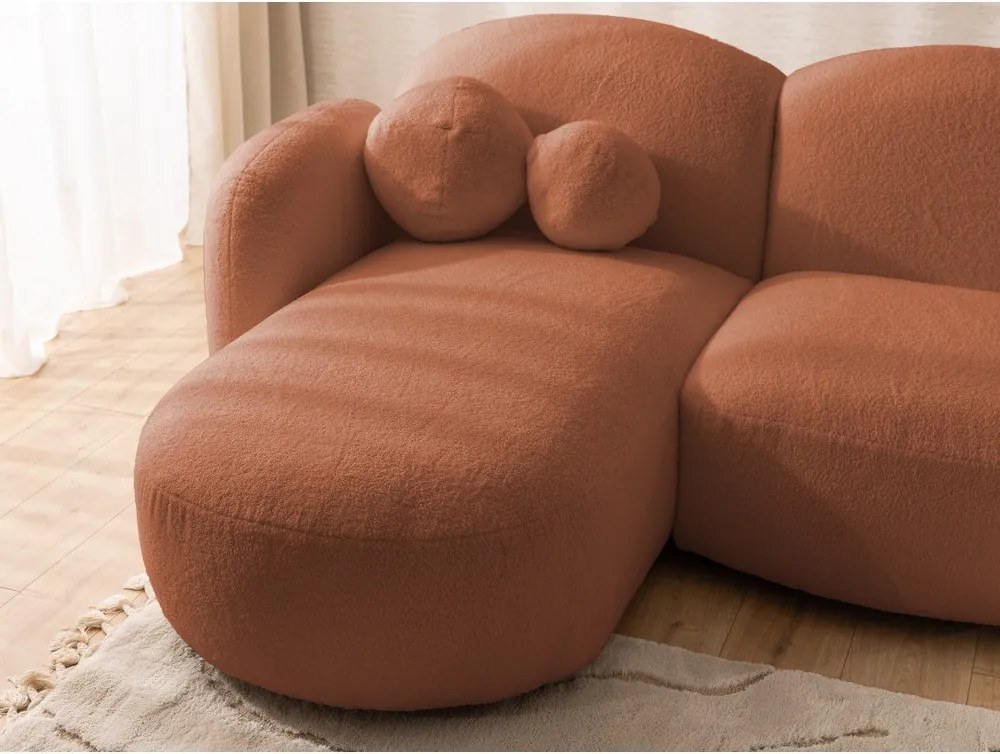Divano angolare color terracotta (a U) con rivestimento in bouclé Orbit – Ropez