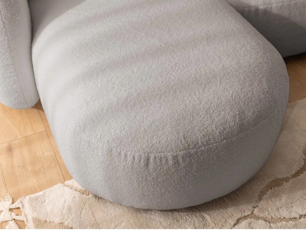 Divano angolare grigio (con penisola a sinistra/con chaise lounge) con rivestimento in bouclé Orbit – Ropez