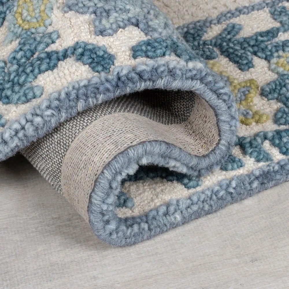 Tappeto blu/avorio in misto lana tessuto a mano 120x170 cm Myla Floral Frame – Flair Rugs