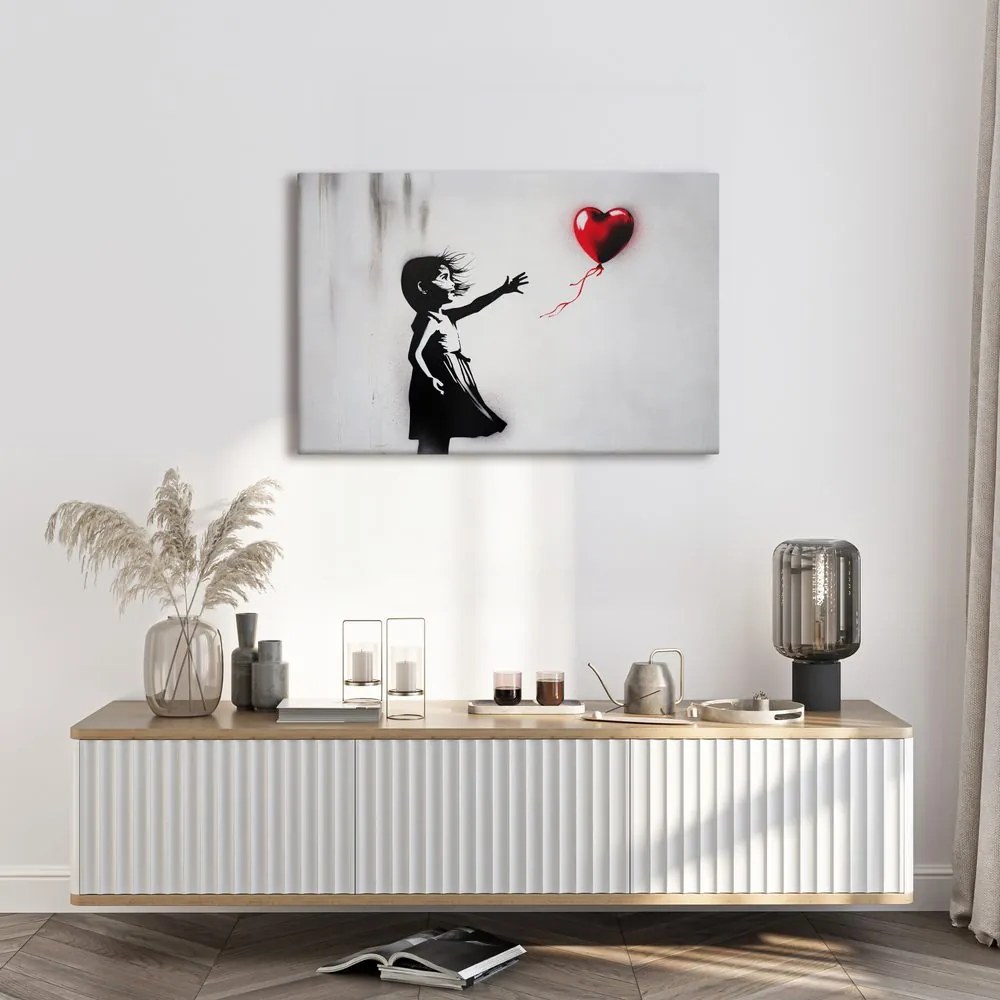 Quadro su tela – Ragazza e cuore volante