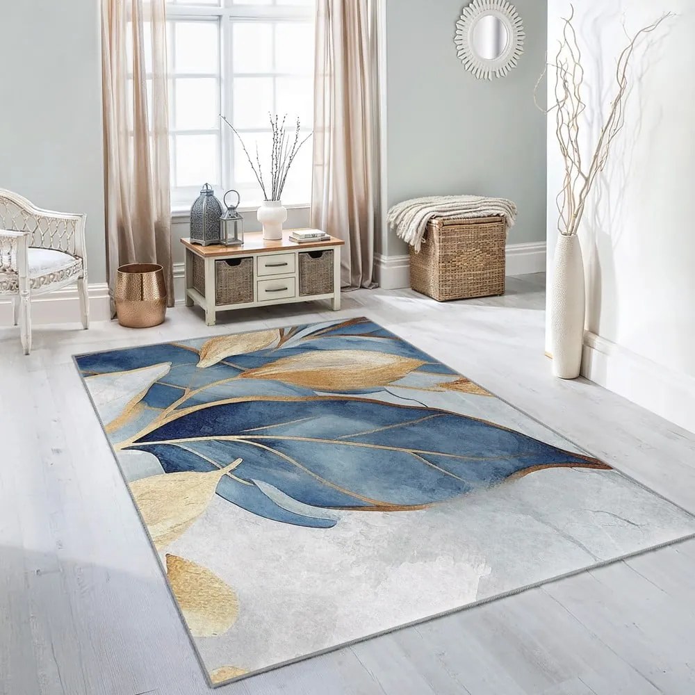Tappeto blu/dorato lavabile 120x180 cm Golden Leaves – Mila Home