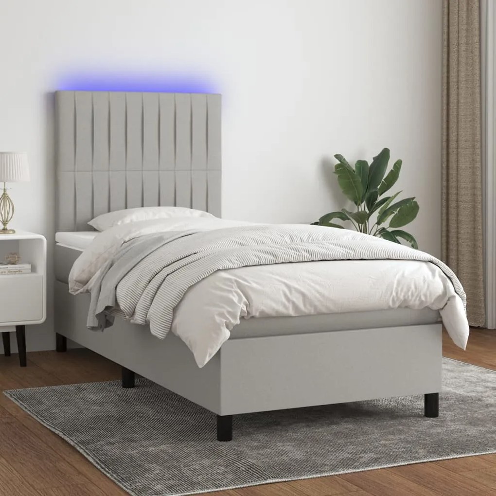 Letto a molle materasso e led grigio chiaro 90x190 cm tessuto