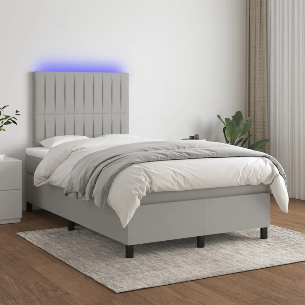 Letto a molle materasso e led grigio chiaro 120x190 cm tessuto