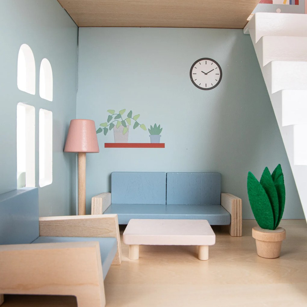 Casa delle bambole in legno con arredamento