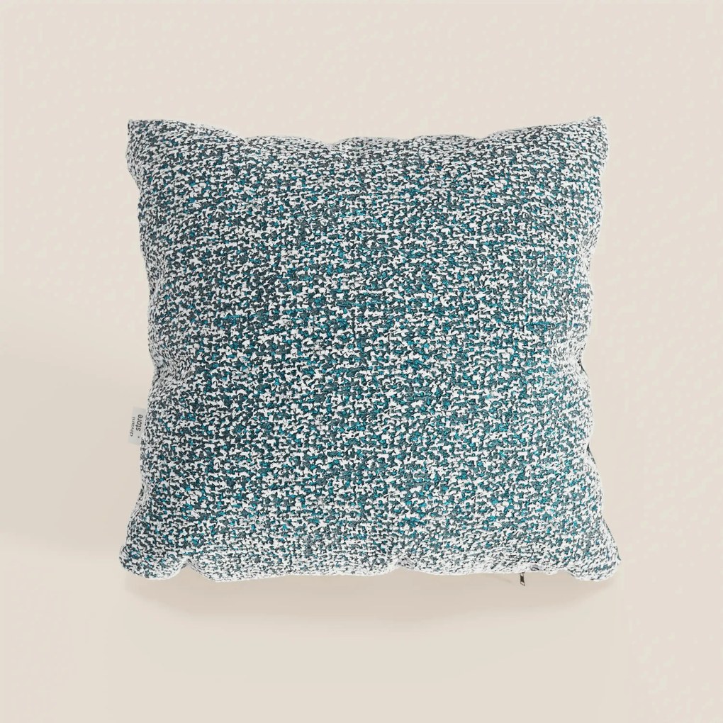Magnolia cuscino disponibile in diversi colori realizzato in pregiato bouclé mélange morbido e strutturato T29.