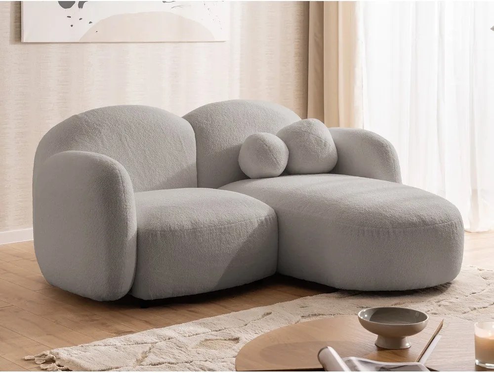 Divano angolare grigio (con penisola a destra/con chaise lounge) con rivestimento in bouclé Orbit – Ropez