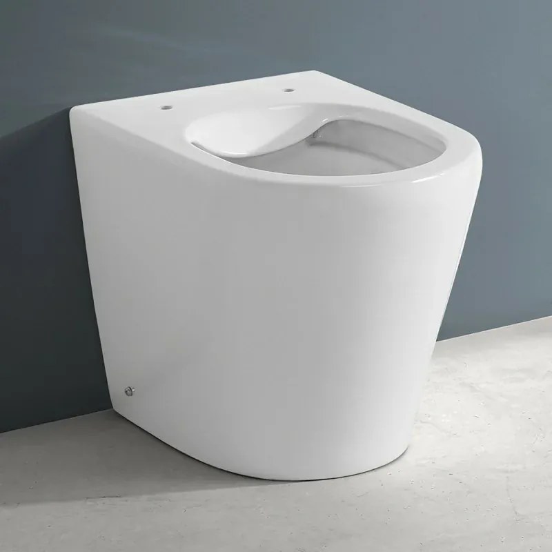 Wc filomuro bianco design tondo in ceramica con scarico Rimless Ukra