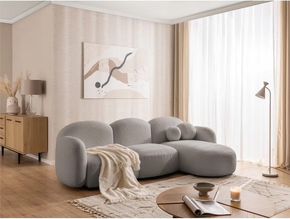 Divano angolare grigio (con penisola a destra/con chaise lounge) con rivestimento in bouclé Orbit – Ropez