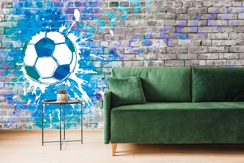 Carta da parati – Palla da Calcio Blu su Muro di Mattoni