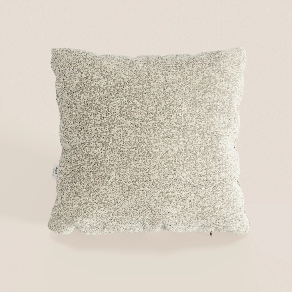 Magnolia cuscino disponibile in diversi colori realizzato in pregiato bouclé mélange morbido e strutturato T29.