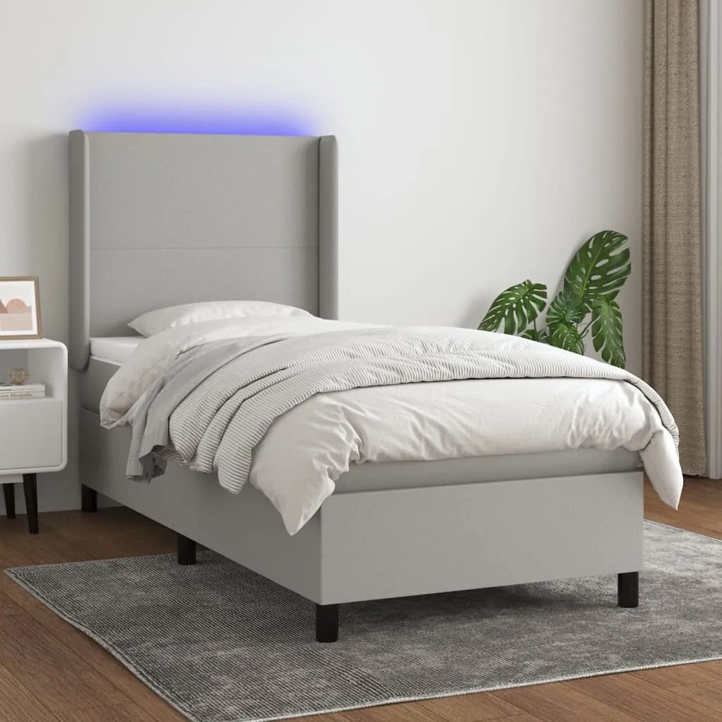 Letto a Molle Materasso e LED Grigio Chiaro 90x190 cm Tessuto