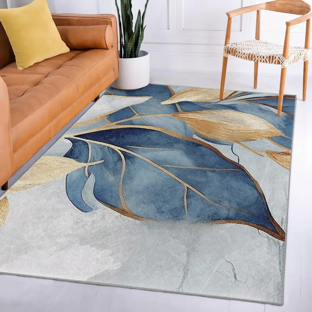 Tappeto blu/dorato lavabile 120x180 cm Golden Leaves – Mila Home