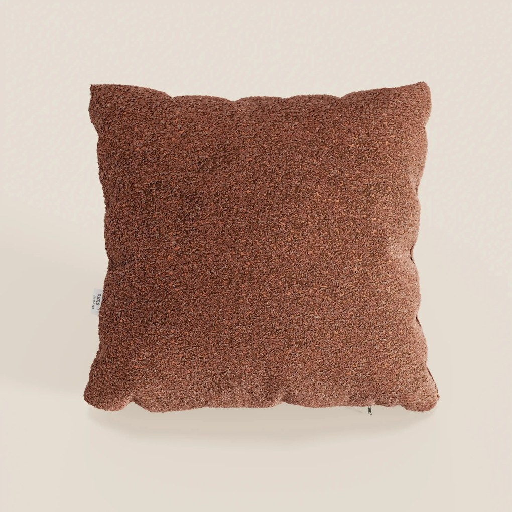 Magnolia cuscino disponibile in diversi colori realizzato in pregiato bouclé mélange morbido e strutturato T29.