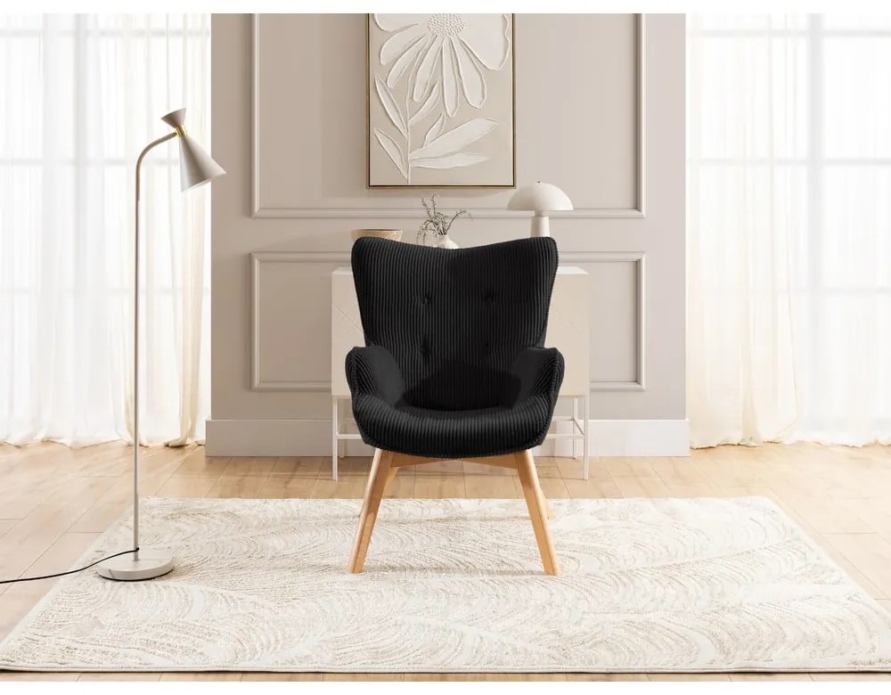 Poltrona con poggiapiedi nera con rivestimento in velluto a coste Niko – Ropez