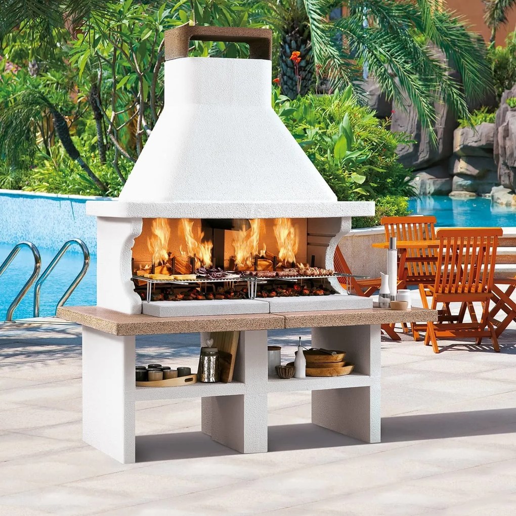 Palazzetti Patmos barbecue a legna con due aree grill e piano in marmotech effetto granito rosso