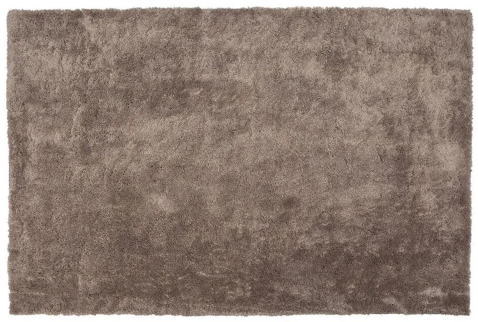 Tappeto shaggy marrone chiaro 140 x 200 cm EVREN Beliani