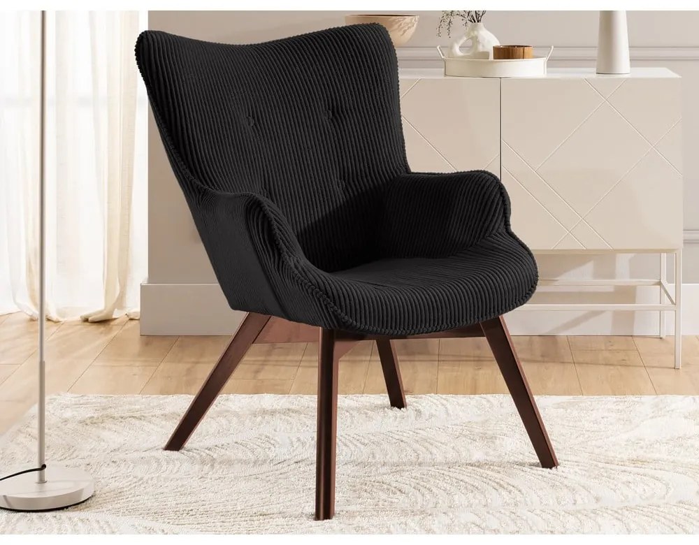 Poltrona con poggiapiedi nera con rivestimento in velluto a coste Niko – Ropez