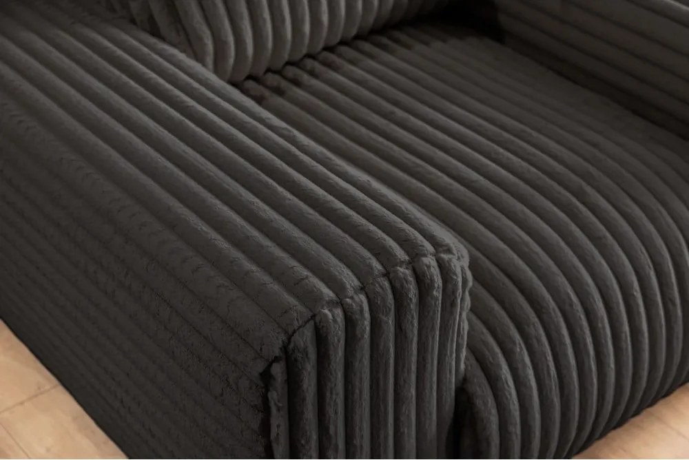 Poltrona grigio scuro con rivestimento in velluto a coste Justin – Ropez