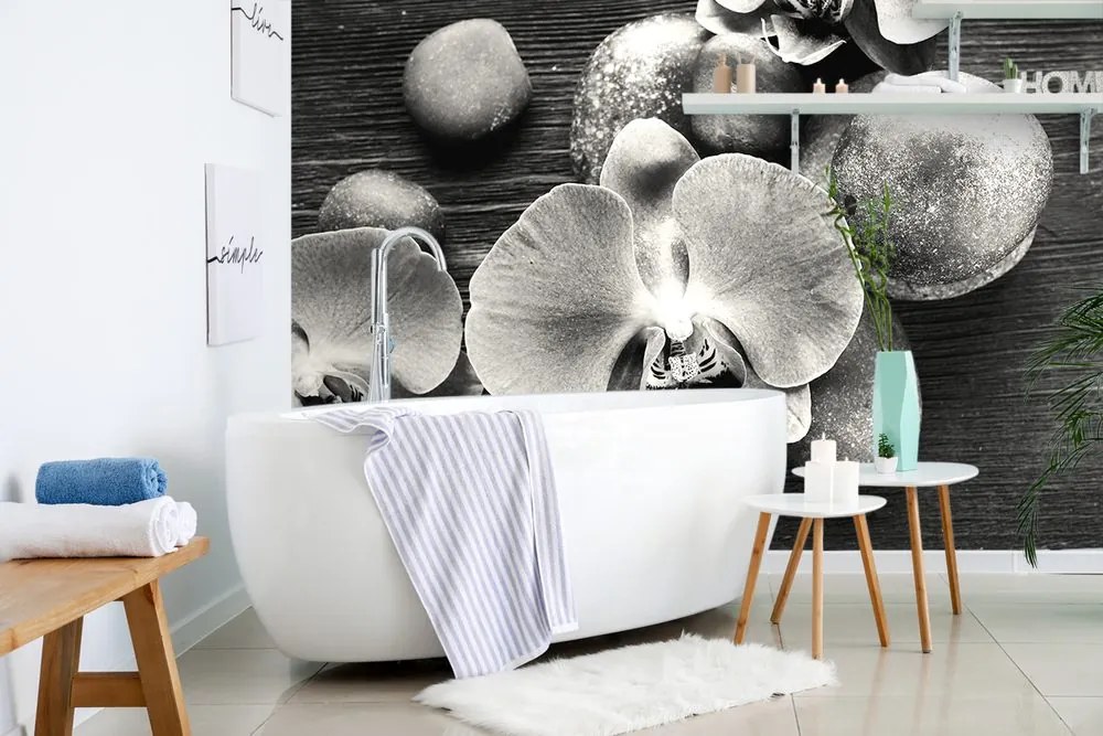 Carta da parati autoadesiva – Orchidea e pietre in bianco e nero