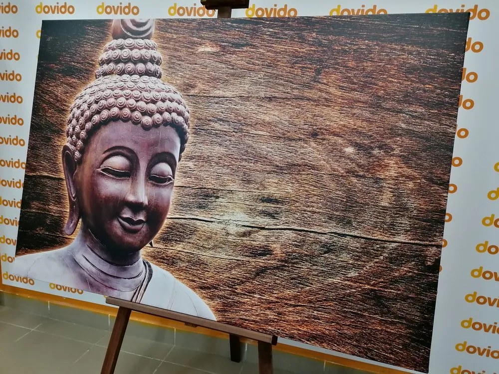 Stampa su tela – Statua del Buddha su sfondo di legno