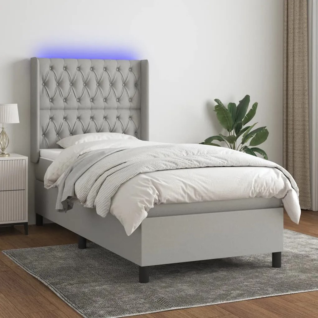 Letto a molle materasso e led grigio chiaro 90x190 cm tessuto