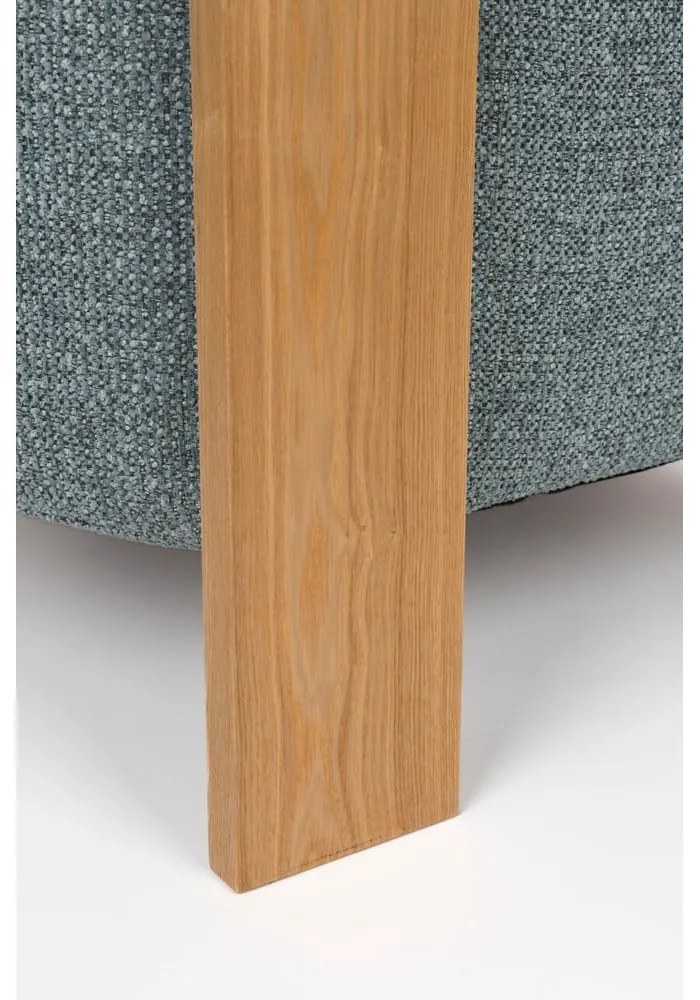 Poltrona blu polveroso con rivestimento in bouclé Oolong – Zuiver