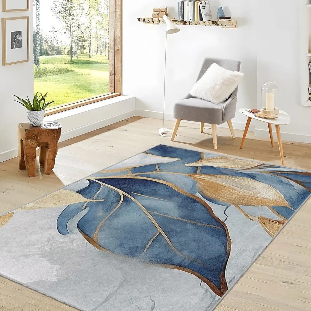 Tappeto blu/dorato lavabile 120x180 cm Golden Leaves – Mila Home