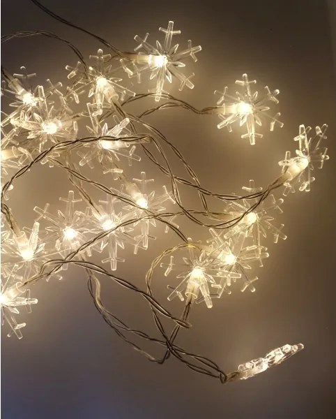 Catena luminosa LED da esterno, 20xLED/2xAA, 2,2 m, IP44, bianco caldo, fiocchi di neve