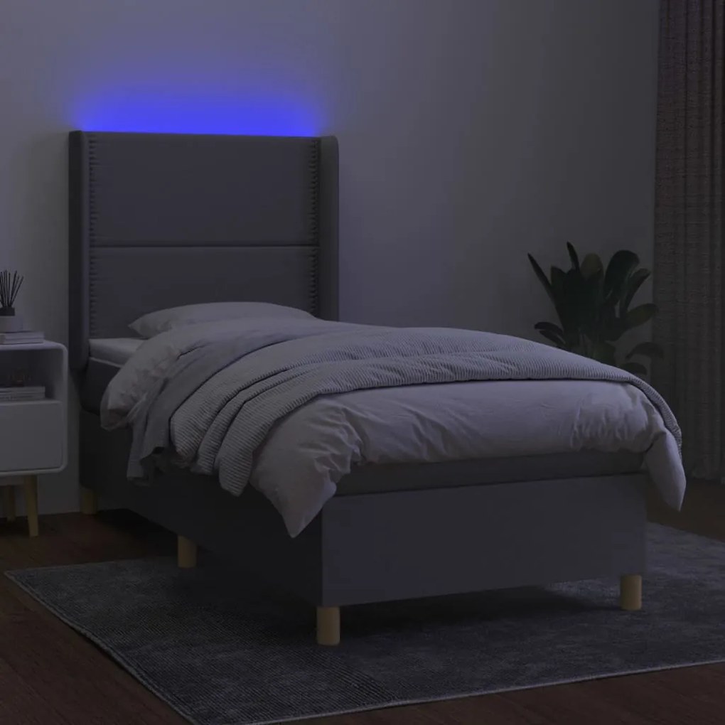 Letto a molle materasso e led grigio chiaro 100x200 cm tessuto