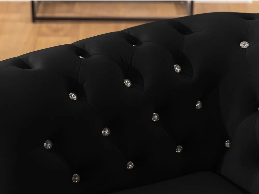 Poltrona chesterfield nera con rivestimento in velluto York Blik – Ropez