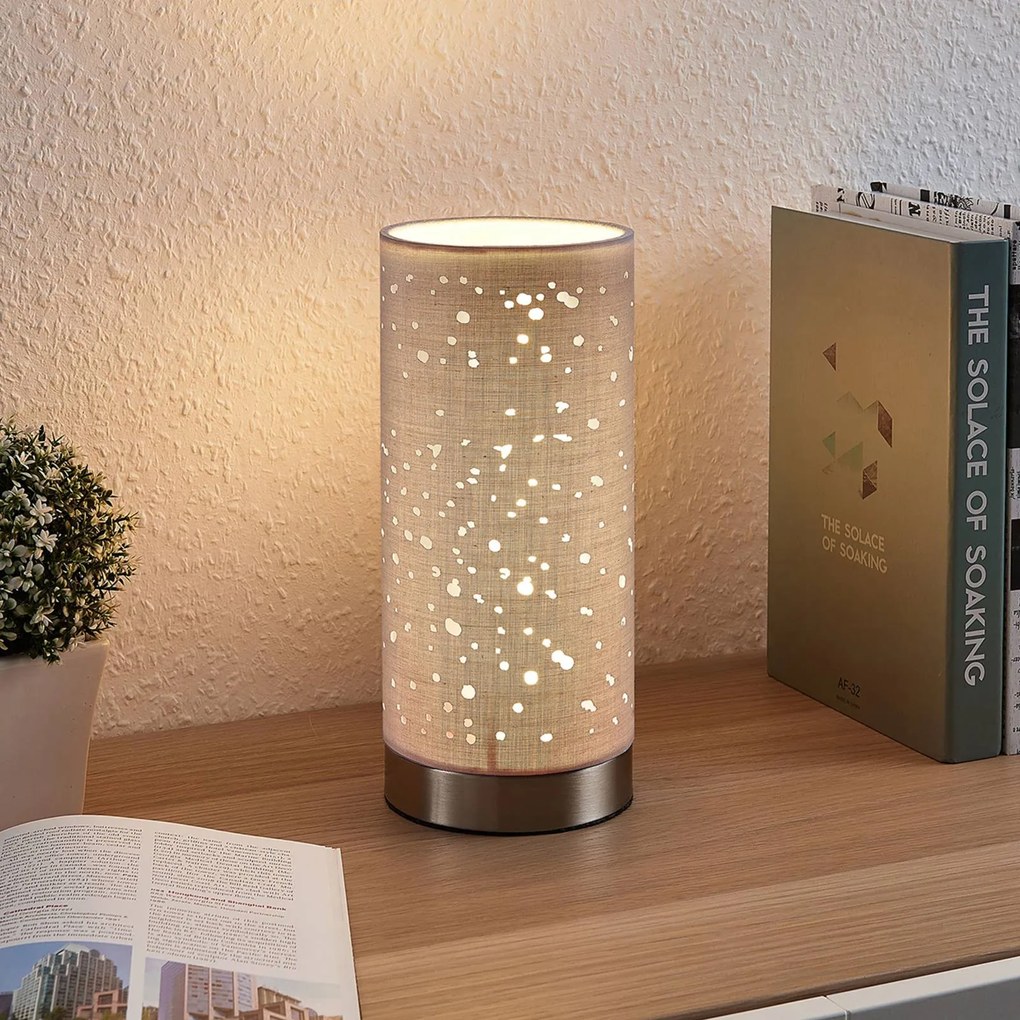 Lindby Lampada da tavolo Umma con aperture, grigia