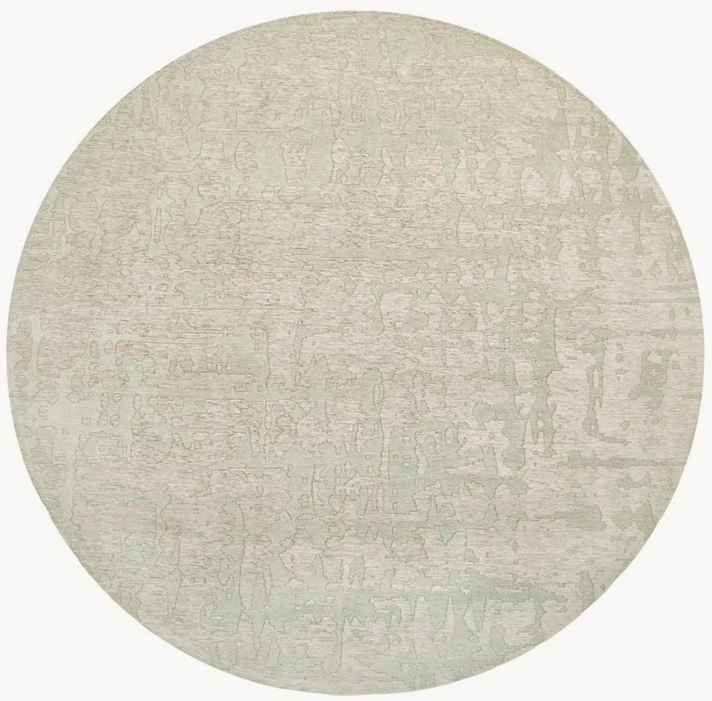 Tappeto rotondo jacquard con motivo in rilievo Baobab