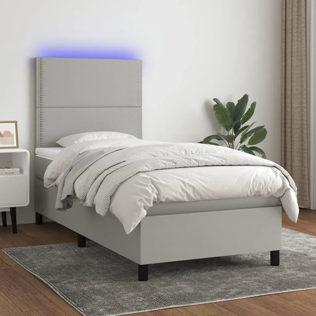 Letto a molle materasso e led grigio chiaro 100x200 cm tessuto