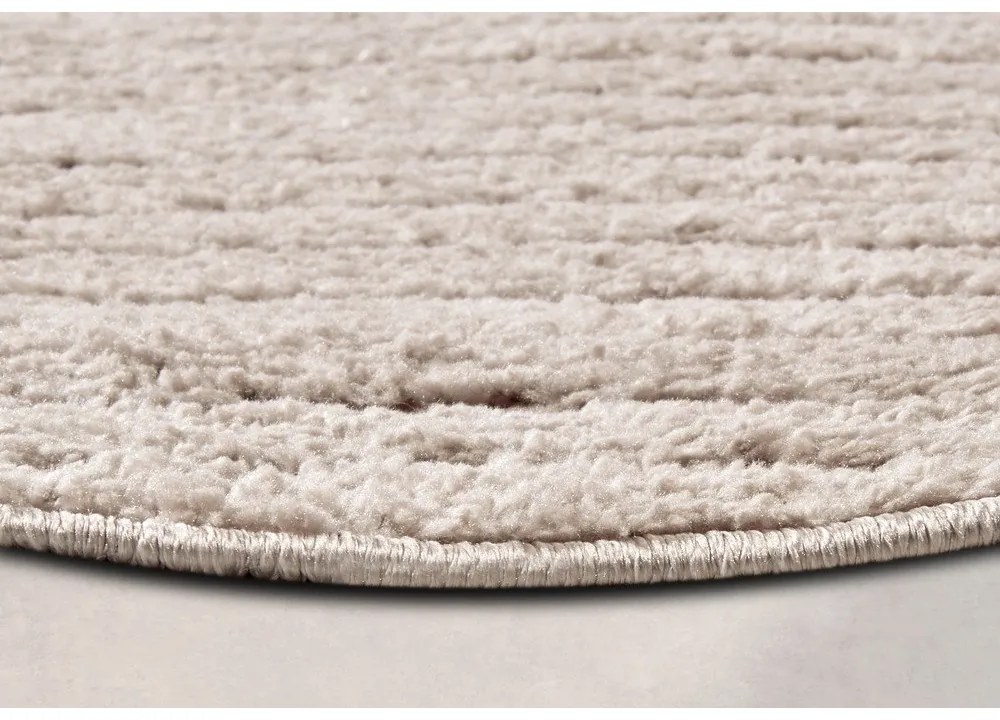 Tappeto rotondo beige ø 160 cm Panglao New York Taupe – Elle Decoration