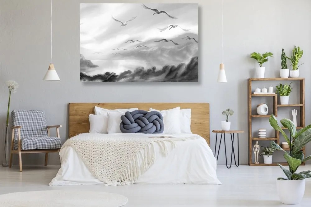 Quadro su tela – Volo di uccelli sopra il paesaggio in bianco e nero