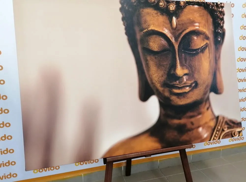 Quadro su tela – Testa di Buddha in bronzo