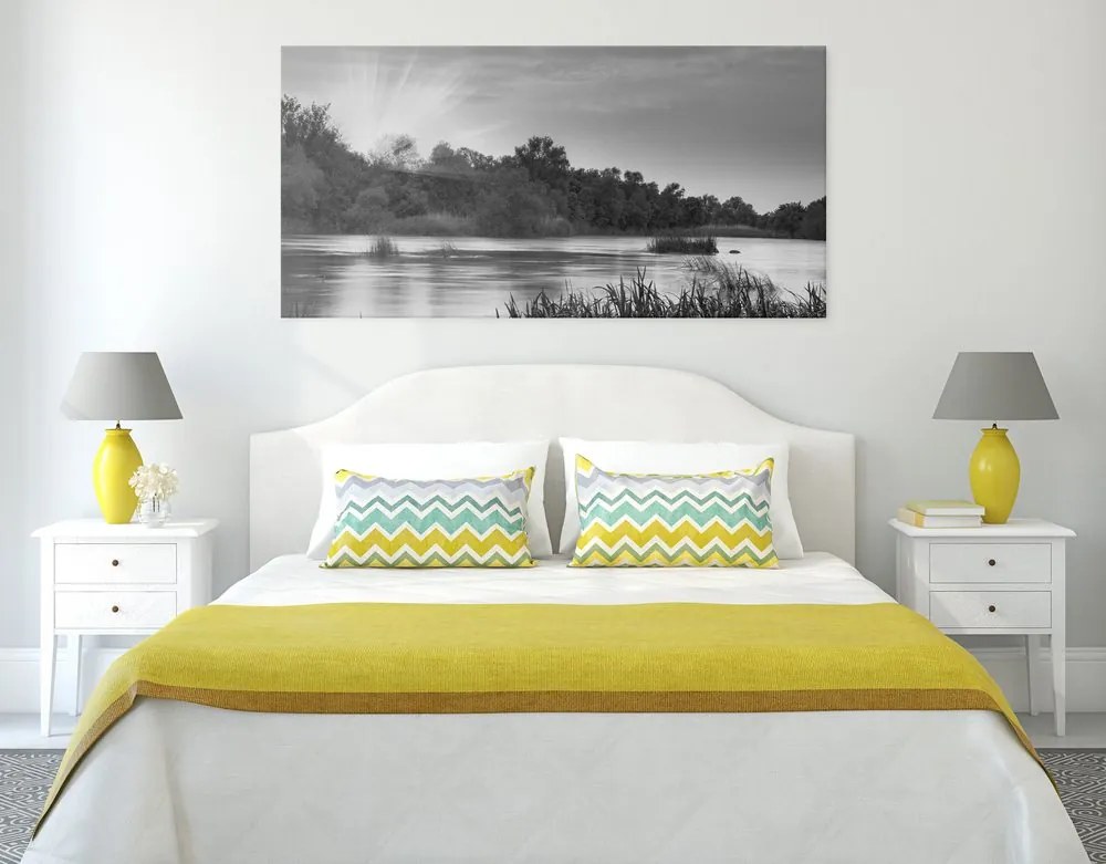 Quadro su tela – Alba sul fiume in bianco e nero