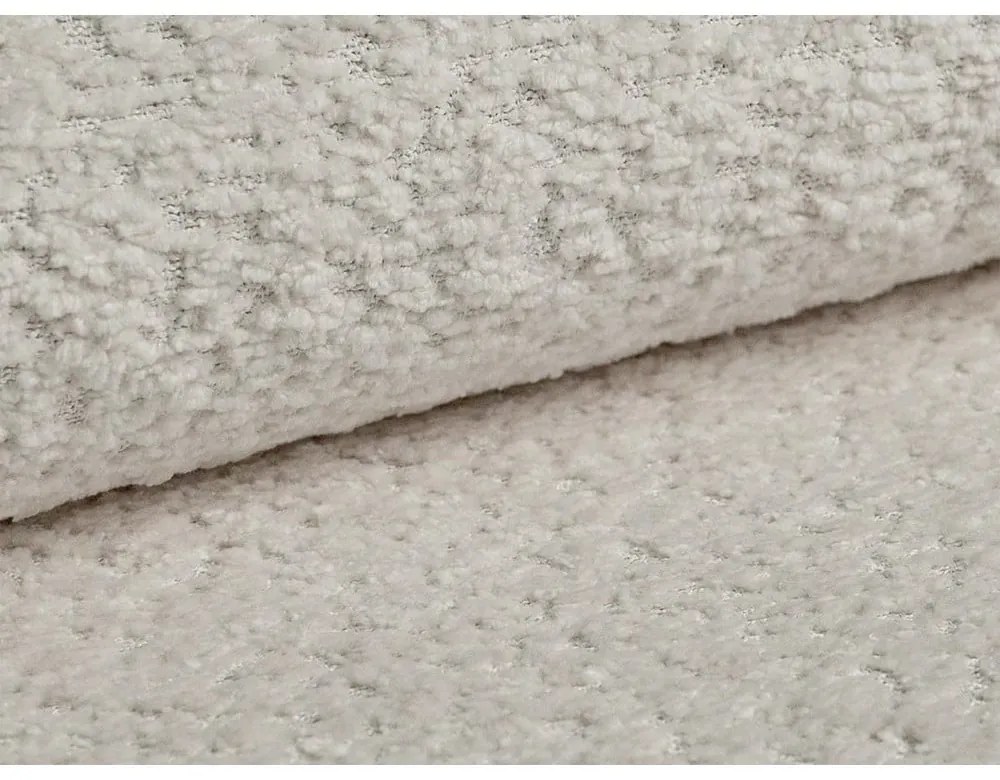 Cuscino per divano beige con rivestimento in bouclé Kemi – Cosmopolitan Design