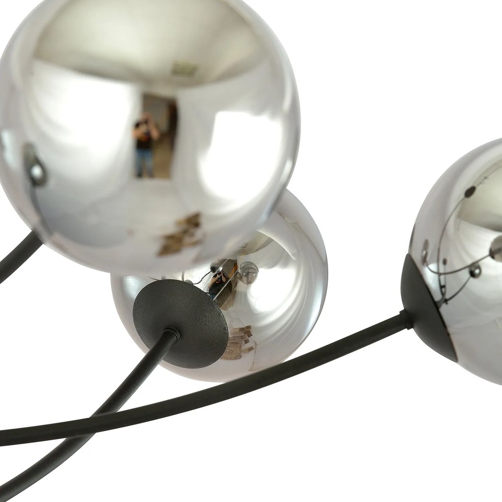 Sospenione Moderna 4 Luci Oceano In Acciaio Nero Bracci Regolabili E Vetro Fumè