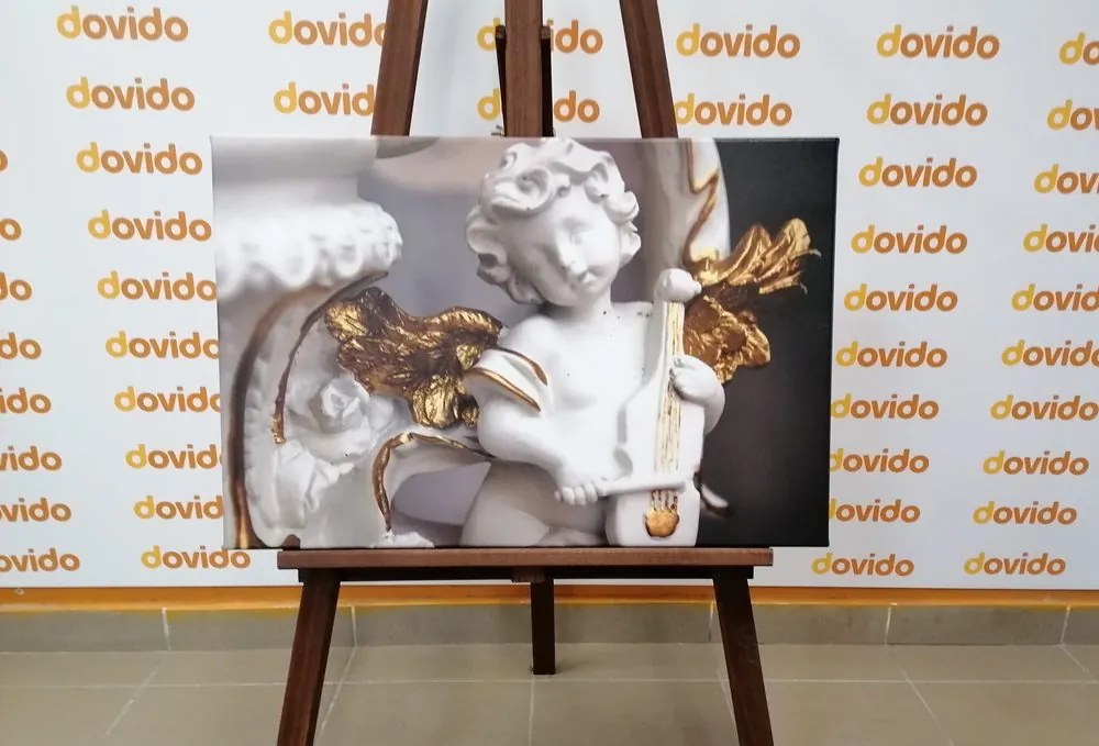 Quadro su tela – Statua di angelo che suona