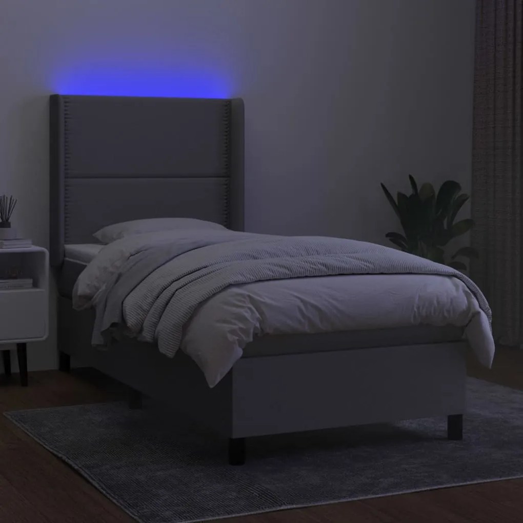 Letto a molle materasso e led grigio chiaro 80x200 cm tessuto