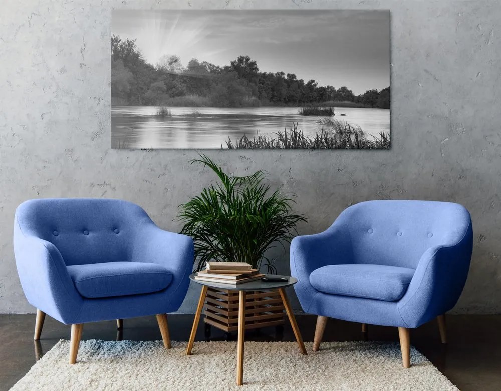 Quadro su tela – Alba sul fiume in bianco e nero